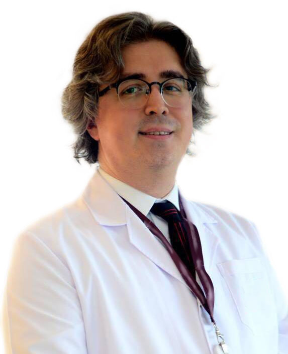 Врач Танер КАЙА